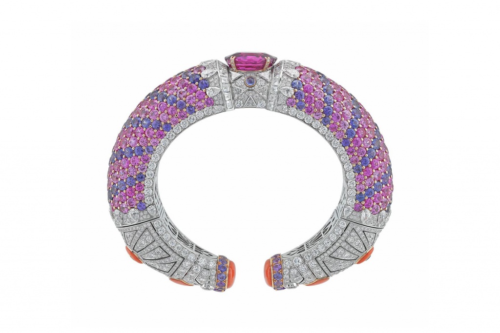 Van_Cleef___Arpels_pink_gold_Protection_Federique_bracelet__set_with_an_oval-cut_Sri_Lankan_pink_sapphire_alongside_pink_and_violet_sapphires__coral_and_diamonds.jpg