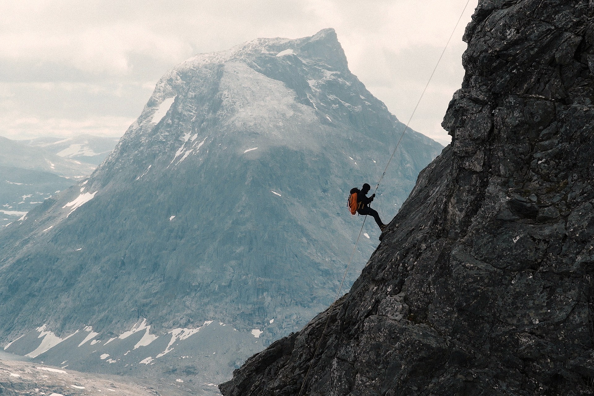 Man on side of mountain